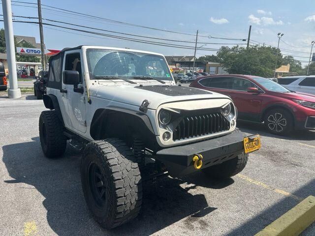 2016 Jeep Wrangler Sport — photo 1 of 12