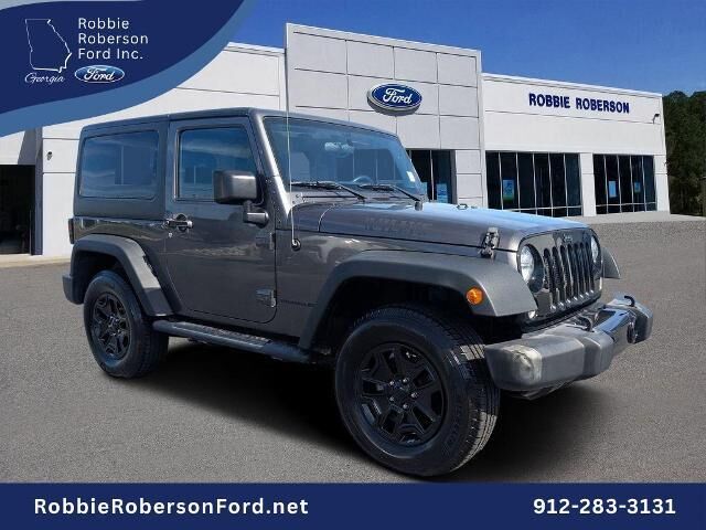 2016 Jeep Wrangler Sport — photo 1 of 26