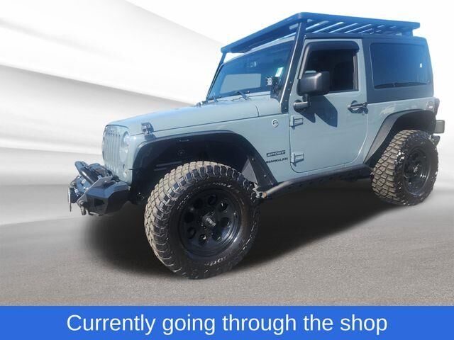 2014 Jeep Wrangler Sport — photo 1 of 33