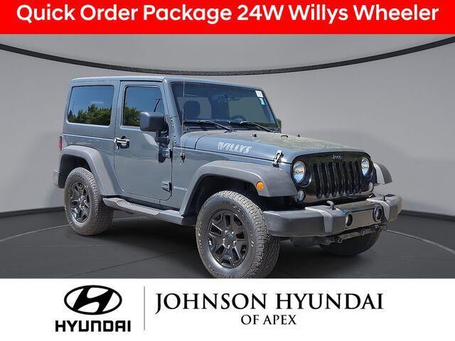 2017 Jeep Wrangler Willys Wheeler — photo 1 of 13