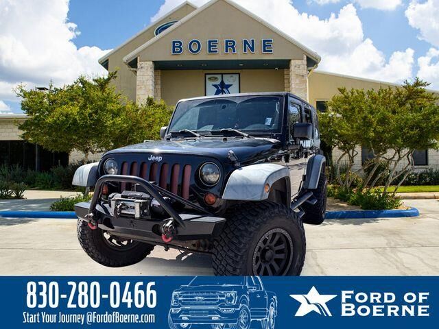 2012 Jeep Wrangler Unlimited Sport — photo 1 of 26