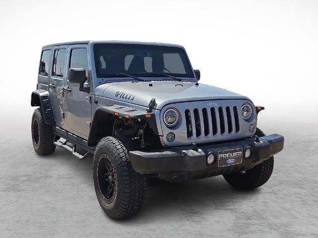 2016 Jeep Wrangler Unlimited Sport — photo 1 of 13