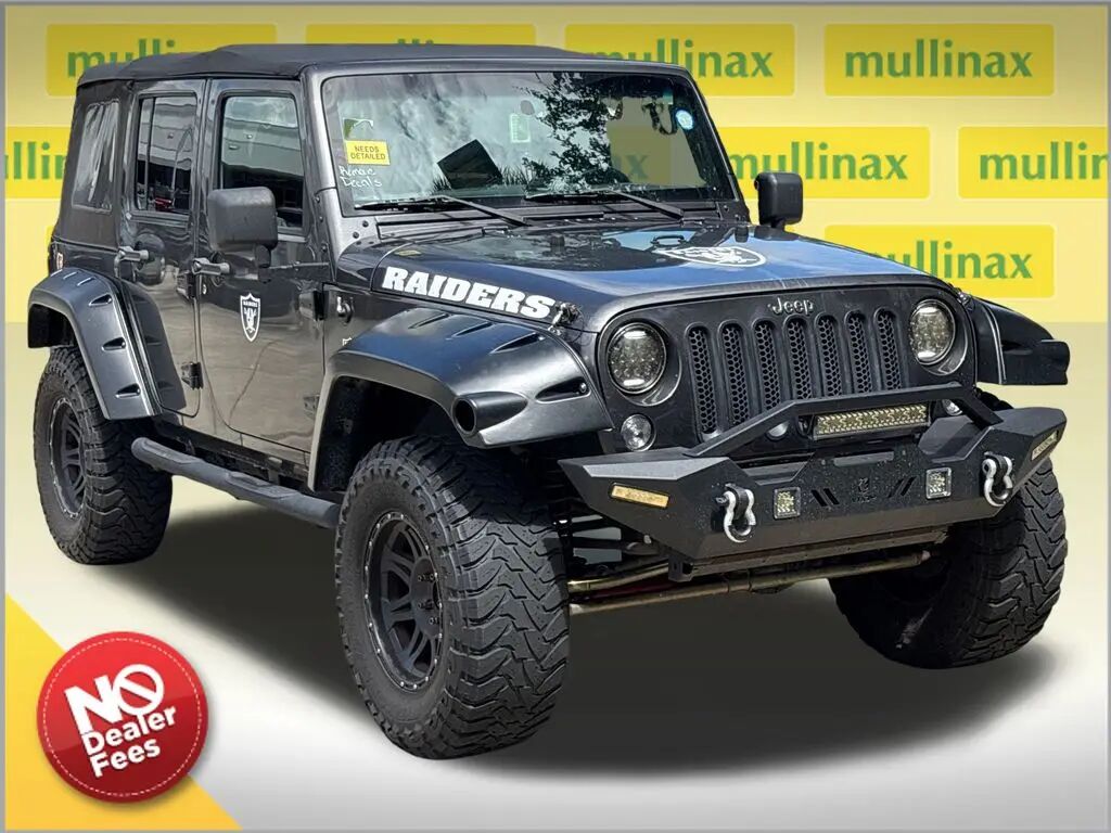 2016 Jeep Wrangler Unlimited Sport — photo 1 of 40