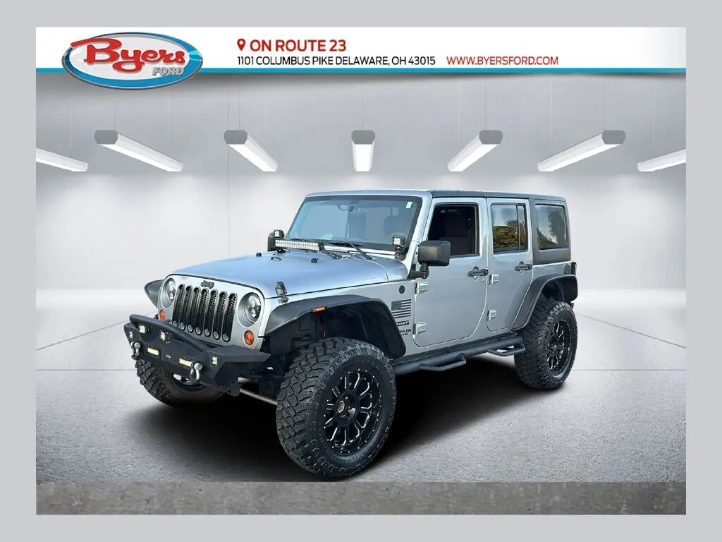 2013 Jeep Wrangler Unlimited Sport — photo 1 of 13