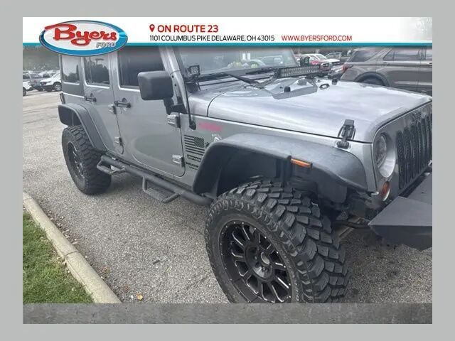 2013 Jeep Wrangler Unlimited Sport — photo 1 of 2