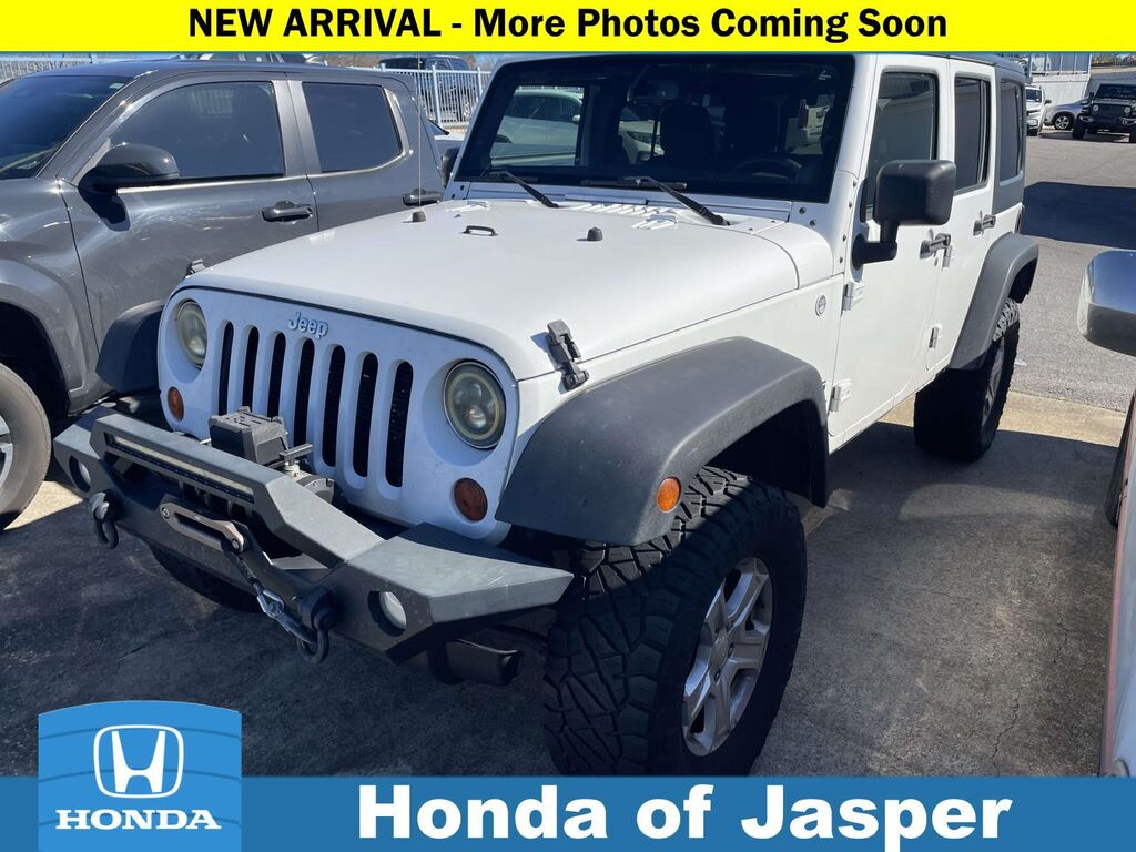 2013 Jeep Wrangler Unlimited Sport — photo 1 of 13
