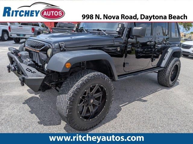 2017 Jeep Wrangler Unlimited Sport — photo 1 of 14