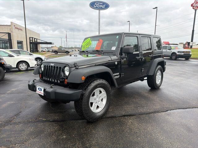 2012 Jeep Wrangler Unlimited Sport — photo 1 of 52