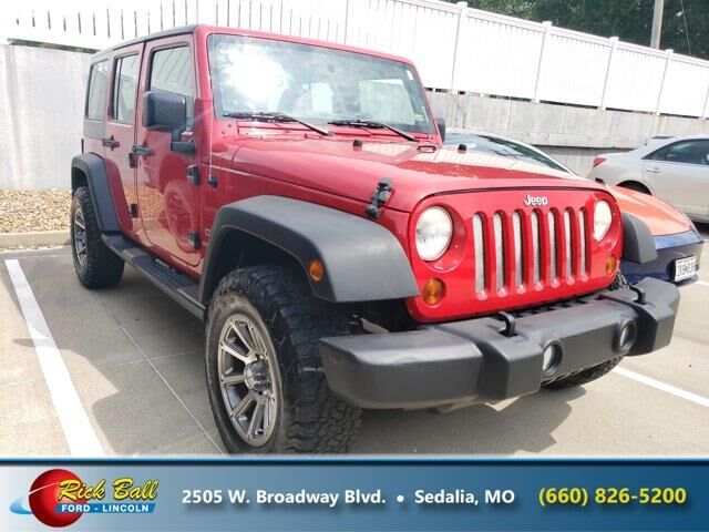 2012 Jeep Wrangler Unlimited Sport — photo 1 of 26