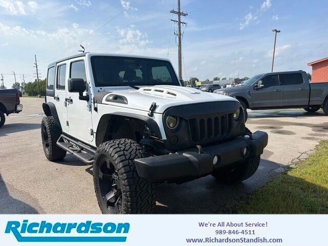 2017 Jeep Wrangler Unlimited Sport — photo 1 of 24