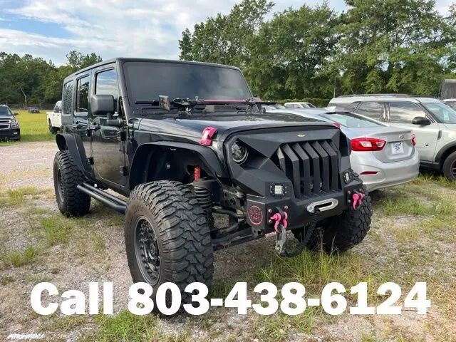 2013 Jeep Wrangler Unlimited Sport — photo 1 of 8