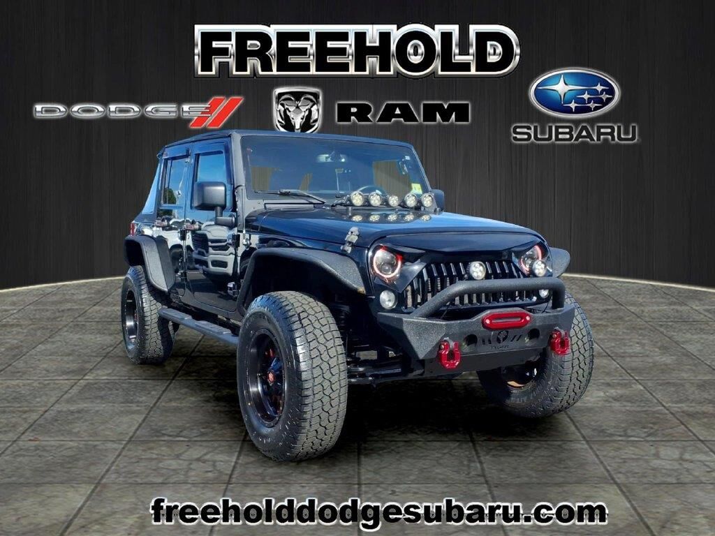 2015 Jeep Wrangler Unlimited Sport — photo 1 of 13