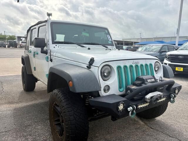 2016 Jeep Wrangler Unlimited Sport — photo 1 of 26