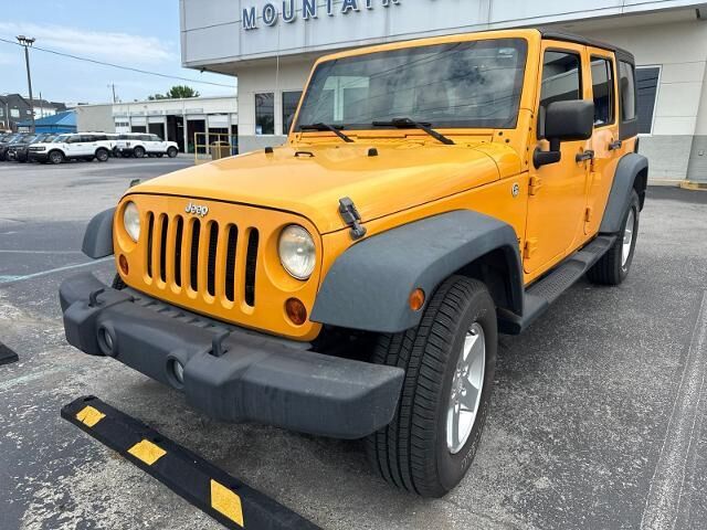 2012 Jeep Wrangler Unlimited Sport — photo 1 of 26