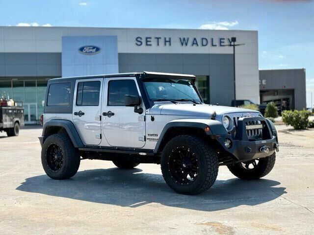 2013 Jeep Wrangler Unlimited Sport — photo 1 of 12