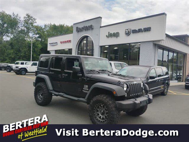2016 Jeep Wrangler Unlimited Sport — photo 1 of 10