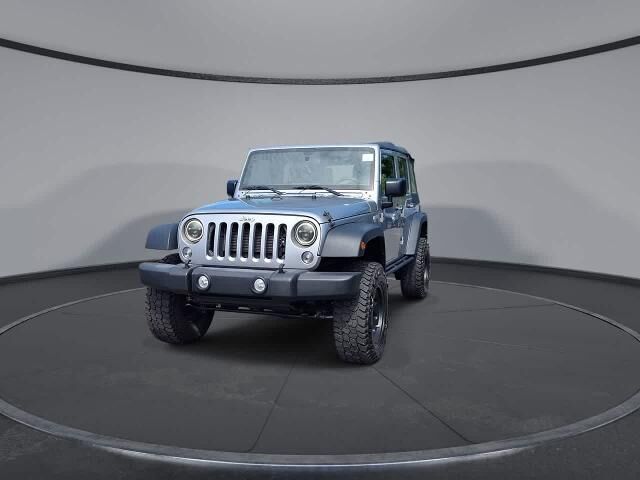 2016 Jeep Wrangler Unlimited Sport — photo 1 of 57