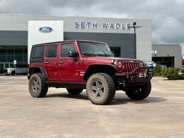 2012 Jeep Wrangler Unlimited Sport — photo 1 of 13