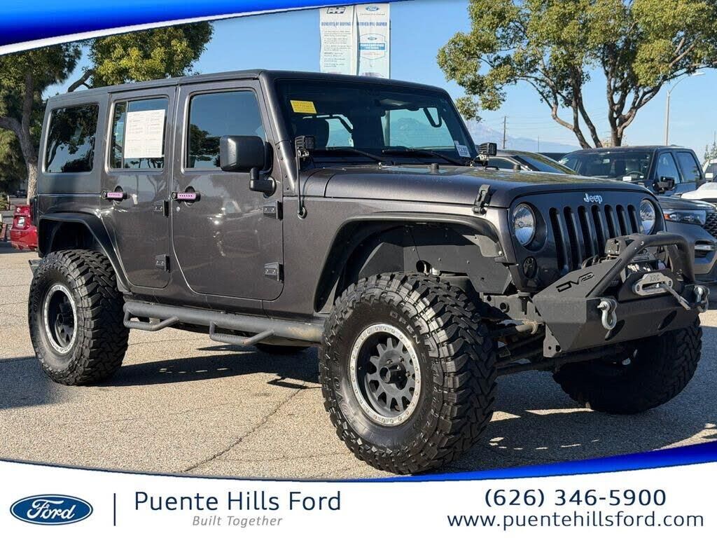 2016 Jeep Wrangler Unlimited Sport — photo 1 of 2