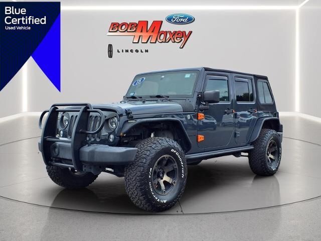 2018 Jeep Wrangler JK Unlimited Sport — photo 1 of 13