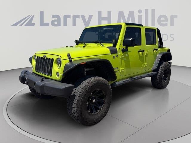 2016 Jeep Wrangler Unlimited Sport — photo 1 of 42