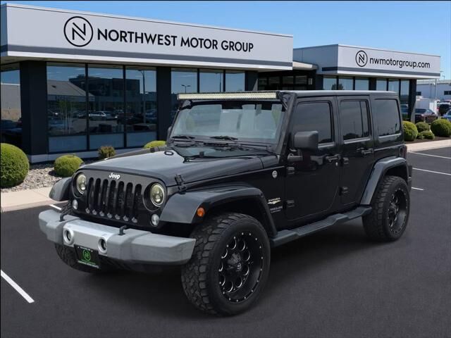 2014 Jeep Wrangler Unlimited Sahara — photo 1 of 26