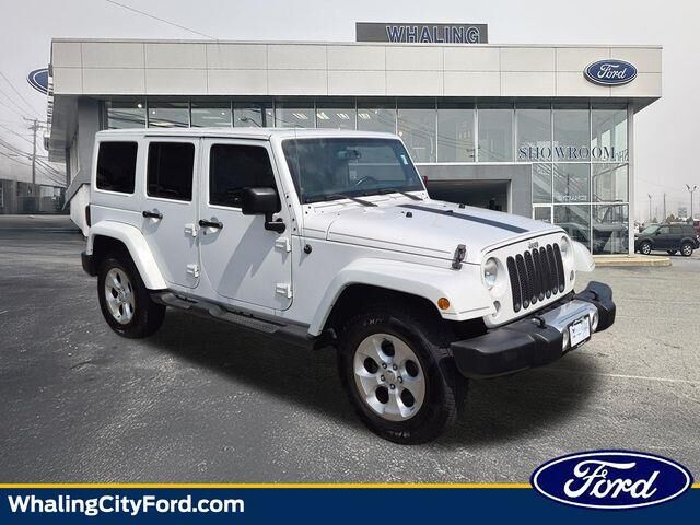 2014 Jeep Wrangler Unlimited Sahara — photo 1 of 13
