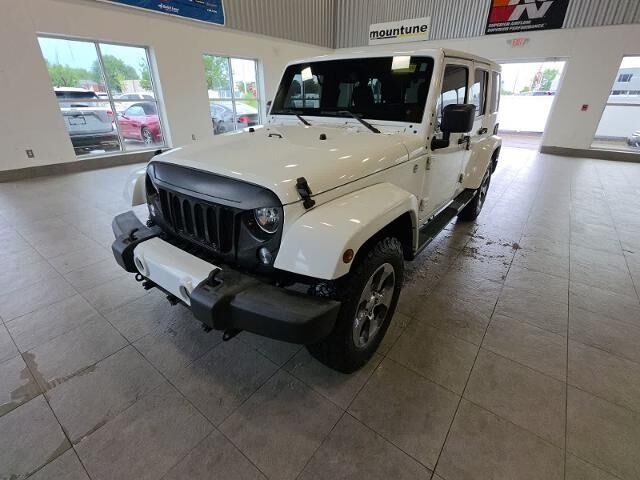 2016 Jeep Wrangler Unlimited Sahara — photo 1 of 13
