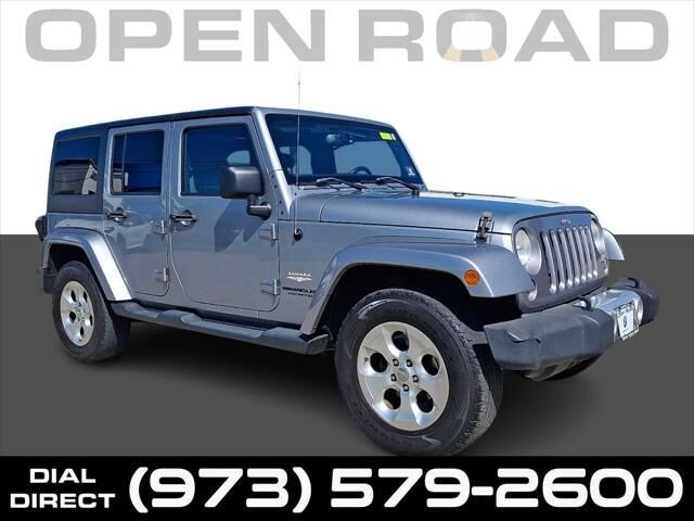 2014 Jeep Wrangler Unlimited Sahara — photo 1 of 13