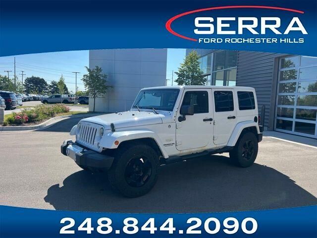 2014 Jeep Wrangler Unlimited Sahara — photo 1 of 13