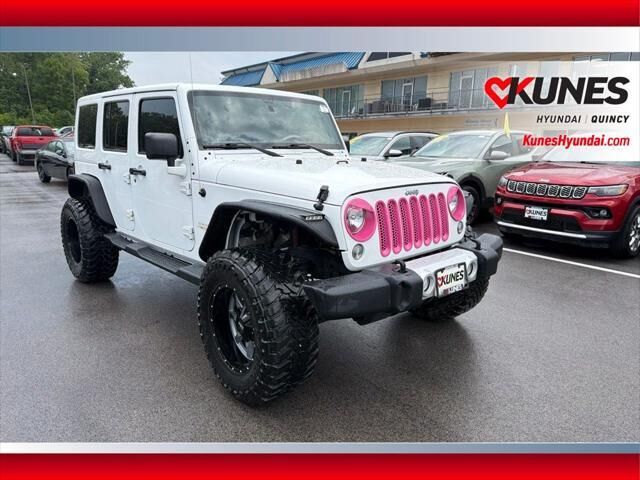 2014 Jeep Wrangler Unlimited Sahara — photo 1 of 39