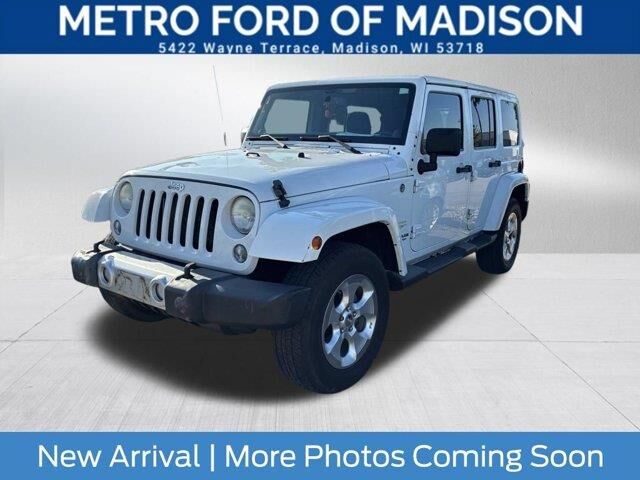2014 Jeep Wrangler Unlimited Sahara — photo 1 of 12