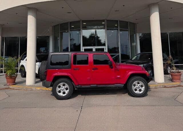 2013 Jeep Wrangler Unlimited Sahara — photo 1 of 40