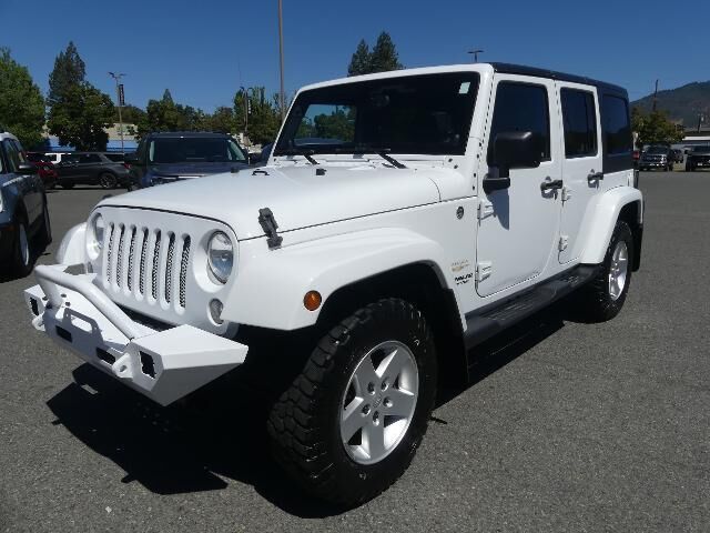 2014 Jeep Wrangler Unlimited Sahara — photo 1 of 13