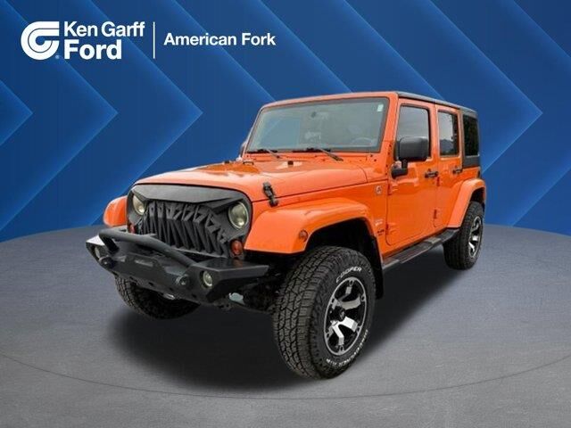 2013 Jeep Wrangler Unlimited Sahara — photo 1 of 13