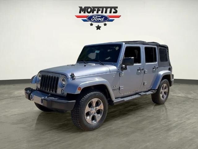 2016 Jeep Wrangler Unlimited Sahara — photo 1 of 13
