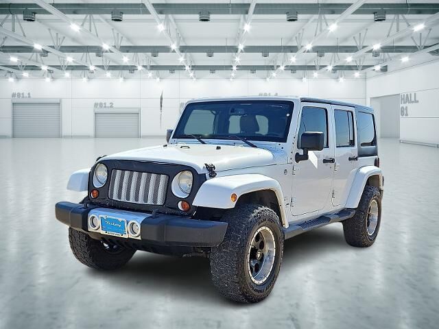 2013 Jeep Wrangler Unlimited Sahara — photo 1 of 13