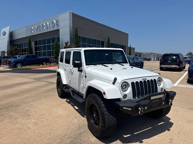 2015 Jeep Wrangler Unlimited Sahara — photo 1 of 11