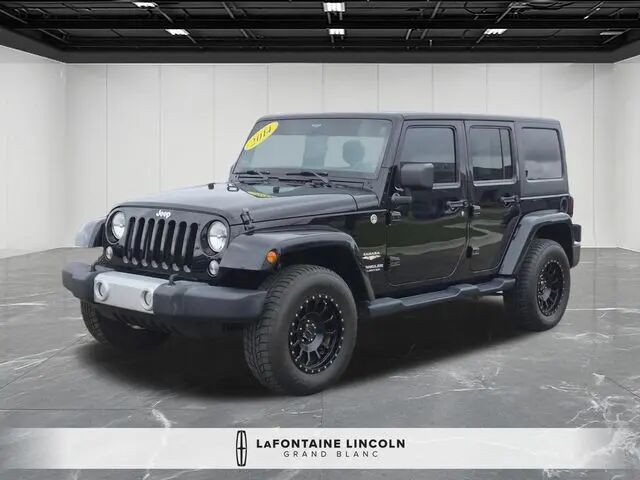 2014 Jeep Wrangler Unlimited Sahara — photo 1 of 13