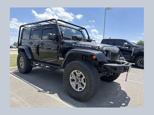 2013 Jeep Wrangler Unlimited Rubicon — photo 1 of 26