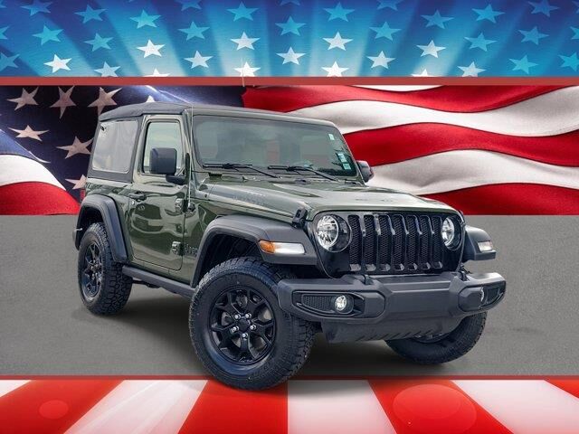 2023 Jeep Wrangler Sport — photo 1 of 13