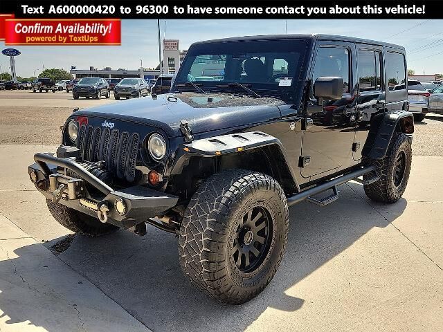 2013 Jeep Wrangler Unlimited Sport — photo 1 of 24