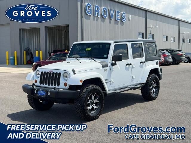 2012 Jeep Wrangler Unlimited Sport — photo 1 of 13