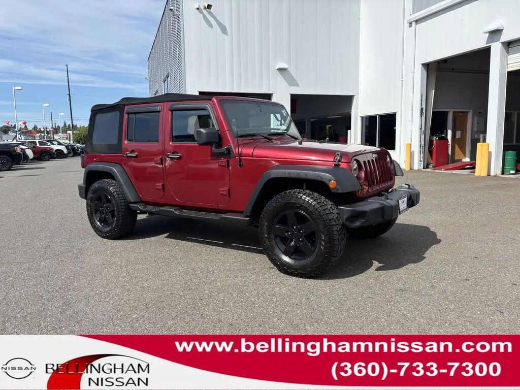 2013 Jeep Wrangler Unlimited Sport — photo 1 of 13