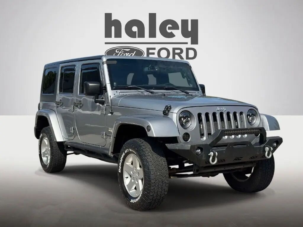 2013 Jeep Wrangler Unlimited Sahara — photo 1 of 13