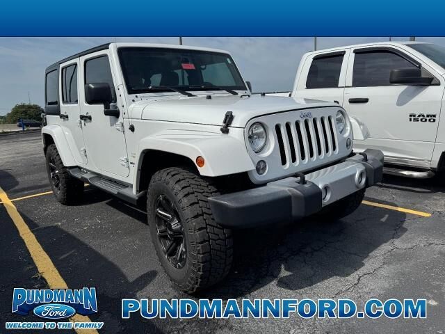 2015 Jeep Wrangler Unlimited Sahara — photo 1 of 13