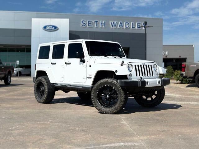 2016 Jeep Wrangler Unlimited Sahara — photo 1 of 13