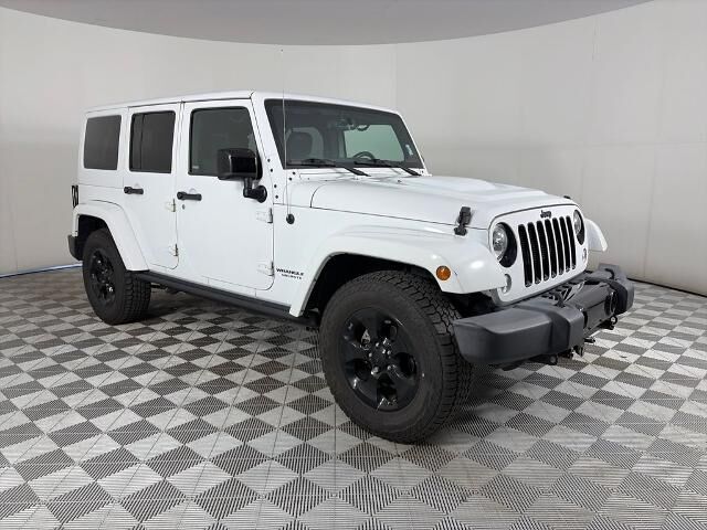 2015 Jeep Wrangler Unlimited Sahara — photo 1 of 26