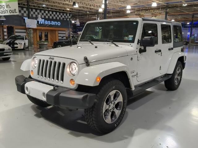 2016 Jeep Wrangler Unlimited Sahara — photo 1 of 13