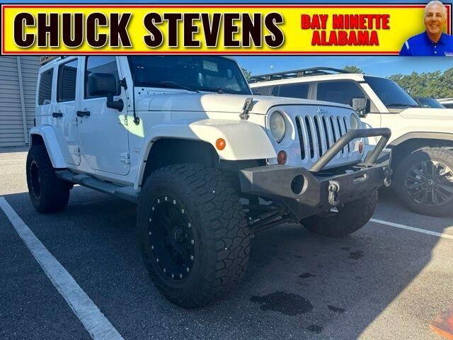 2013 Jeep Wrangler Unlimited Sahara — photo 1 of 26